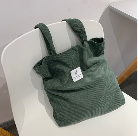 Casual dames draagtas van corduroy, ruim genoeg voor al je dagelijkse avonturen. Een comfortabele keuze.