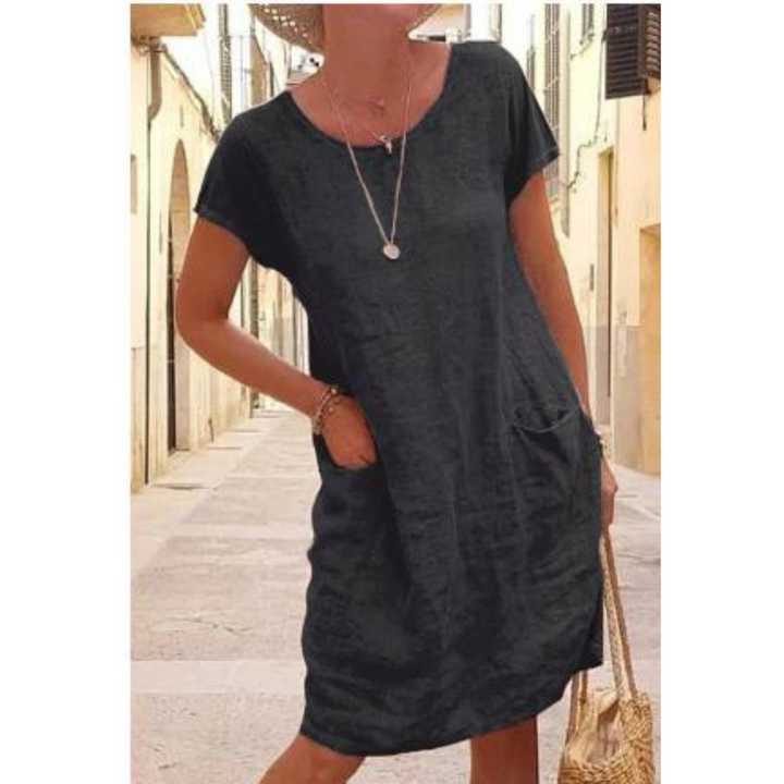 Veelzijdige damesjurk met ronde hals en zakken, perfect als casual zomerjurk of voor alledaags comfort.