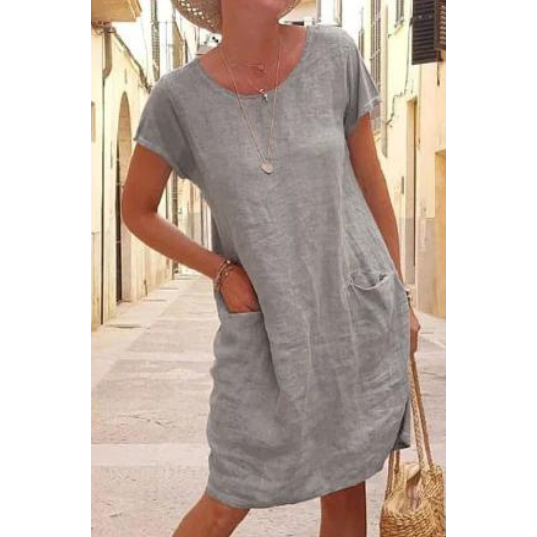 Casual dames jurk tot op de knie met handige zakken. Losse pasvorm, ideaal voor een relaxte zomerlook.