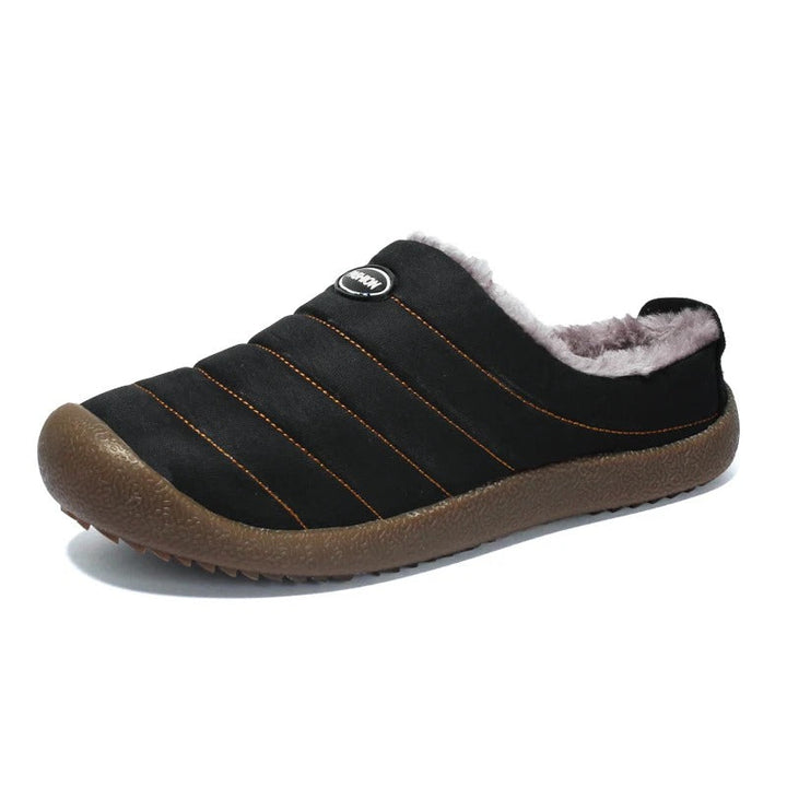 Gezellige CozyWarm herenpantoffels, gevoerd voor warme winteravonden. Ultiem comfort thuis.
