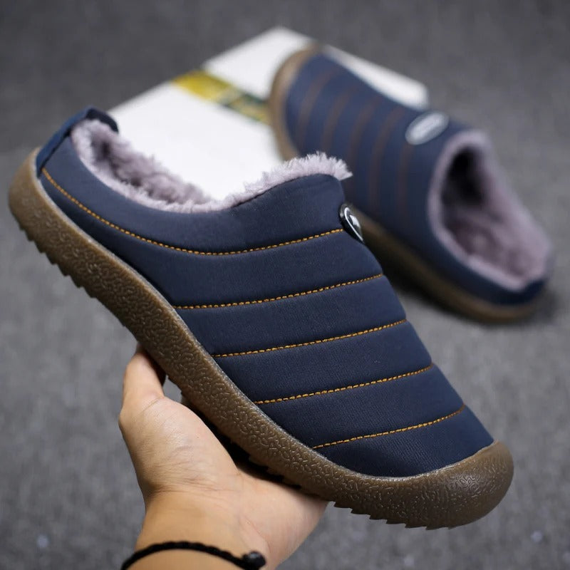 Warme CozyWarm herenpantoffels, gevoerd voor koude winterdagen. Ultiem comfort voor thuis.