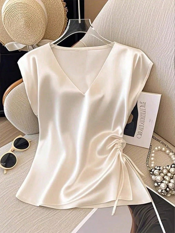 Lichtgewicht dames V-hals top met mouwloos design. Comfortabel en elegant, met verstelbare zoom voor de perfecte look.