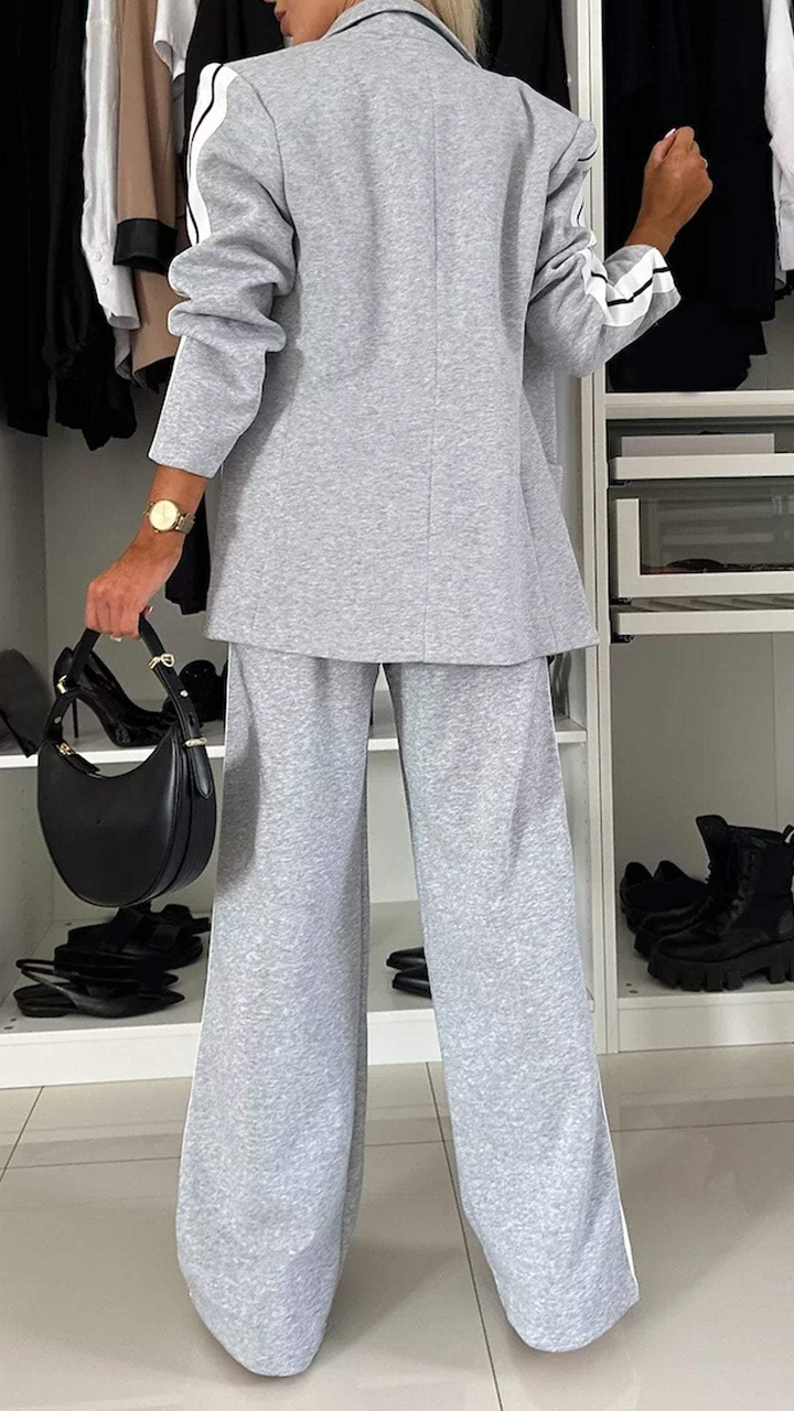Zakelijk dames 2-delig pak: stijlvolle blazer en broek set voor een professionele en comfortabele uitstraling.