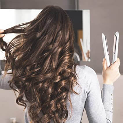 Efficiënte HairToolz™ 2-in-1 krultang en stijltang. Bespaar ruimte en tijd met deze complete haarstyling tool.