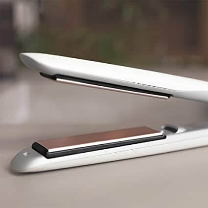 Compacte HairToolz™ 2-in-1 krultang en stijltang, ideaal voor reizen. Snelle en makkelijke haarstyling voor dames.