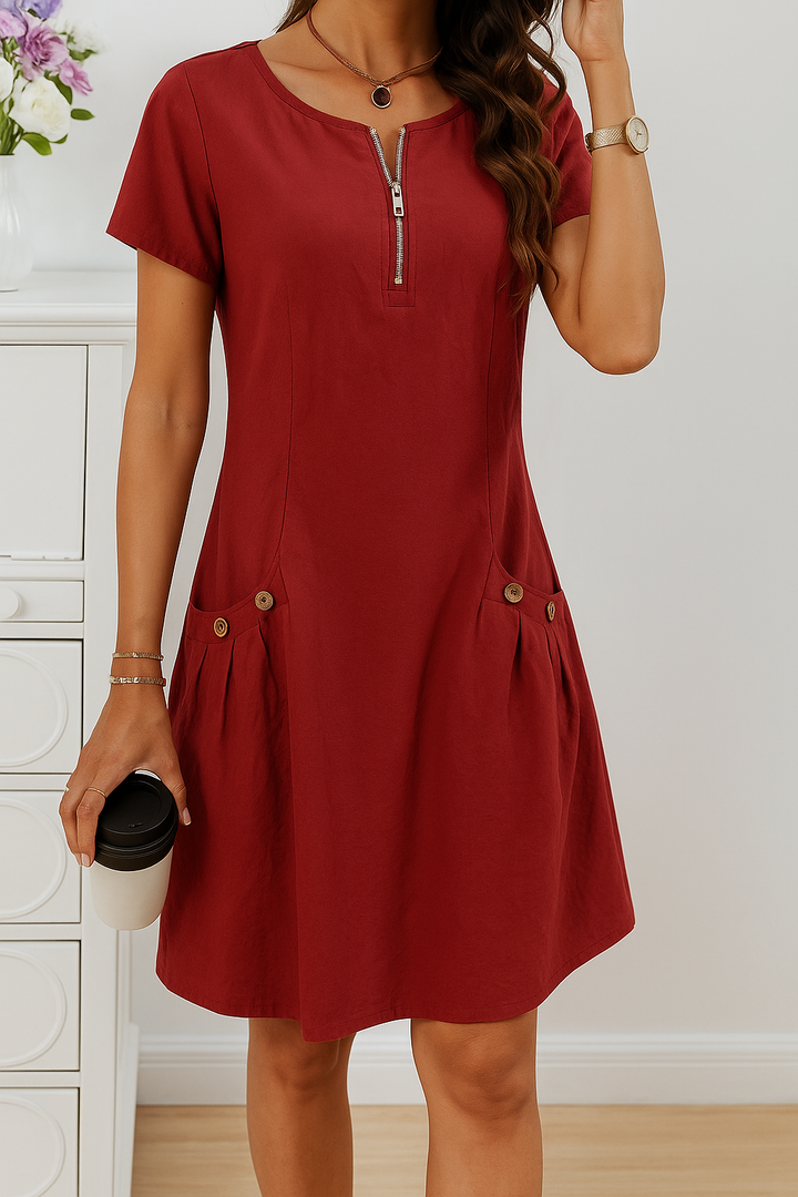 Comfortabele damesjurk, A-lijn, met korte mouwen en knielengte. Perfecte midi jurk voor zomerse dagen.