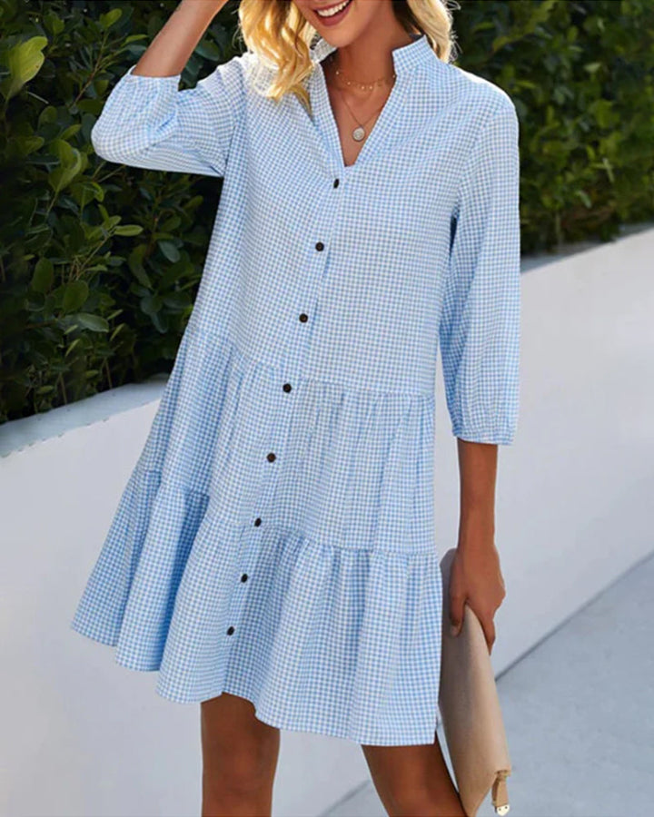 Dames A-lijn zomerjurk met trendy ruitpatroon, perfect voor casual dagen en warme temperaturen.