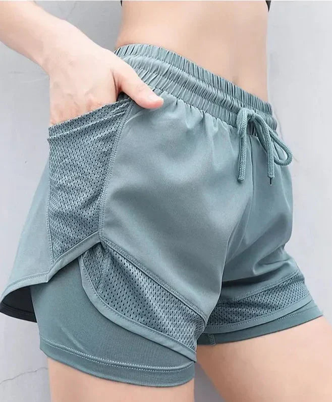 High-waist dames shorts, ademend en sneldrogend. Ideale sportkleding voor training, yoga en dagelijks comfort.