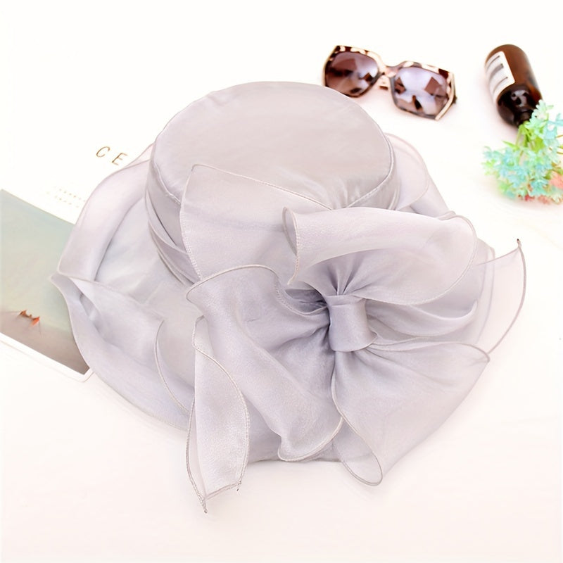 Ademende dames zomerhoed Alara, brede rand en lichtgewicht polyester voor comfortabele zonbescherming.