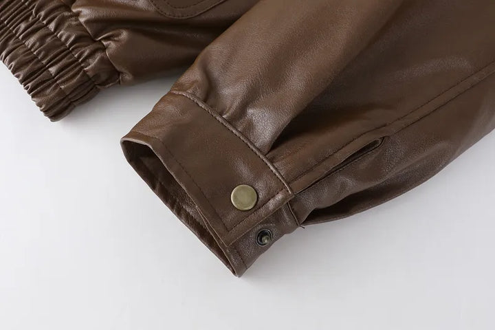 Stijlvolle zwarte leren damesjas, vintage model met zachte lamswol voering, trendy bovenkleding.