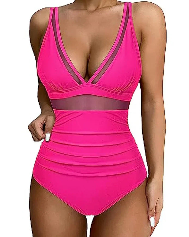 Trendy Leona dames badpak met luipaardprint. Flatterende pasvorm en verstelbare bandjes voor zomerse strandmode.