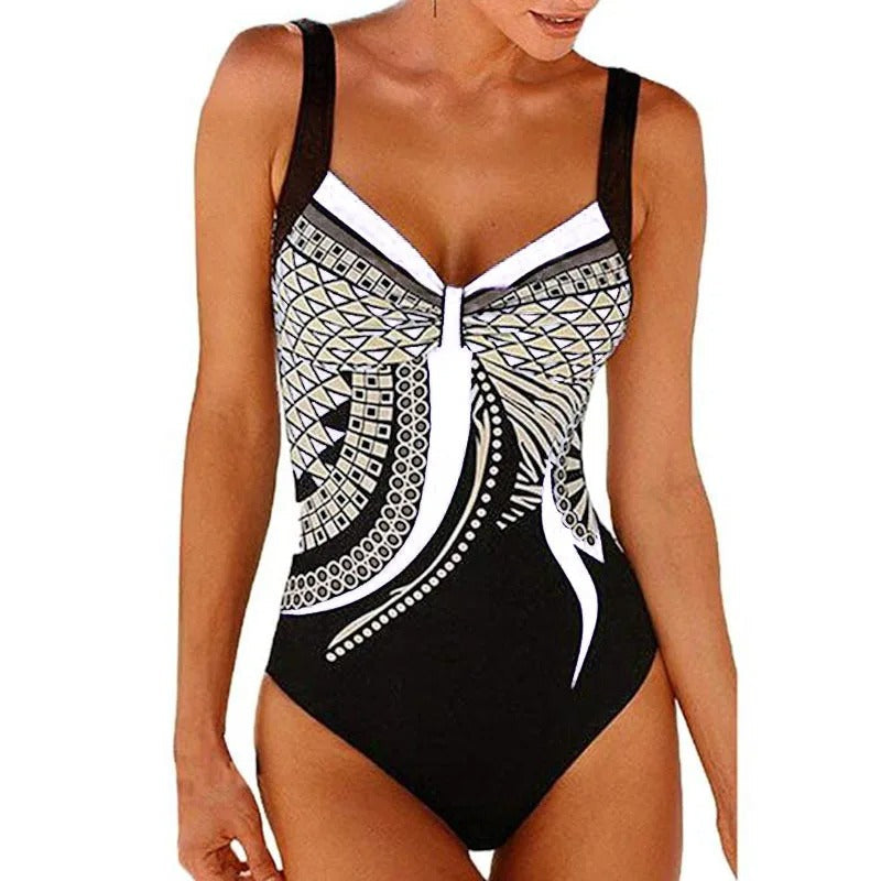 Comfortabel dames badpak met chloorbestendige, sneldrogende stof en trendy bedrukking. Flatterend design.