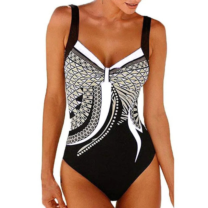 Comfortabel dames badpak met chloorbestendige, sneldrogende stof en trendy bedrukking. Flatterend design.