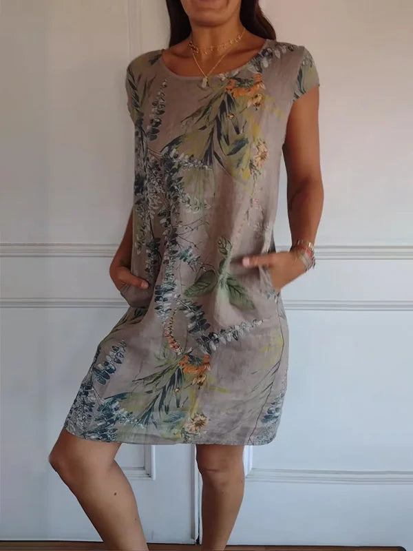 Stijlvolle zomerjurk Eveline voor dames, met levendige print en comfortabele ronde hals.