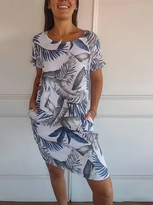 Veelzijdige bedrukte damesjurk met ronde hals, geschikt voor zowel casual als elegante gelegenheden.