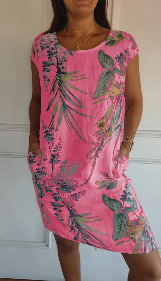 Elegante damesjurk met unieke print en ronde hals, biedt stijlvol comfort voor elke vrouw.