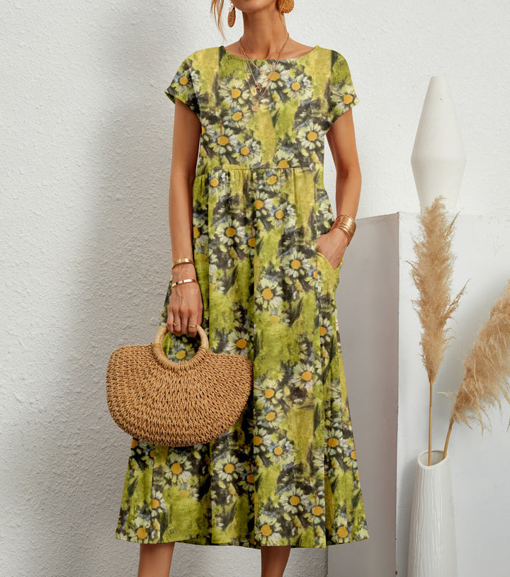 Elegante midi damesjurk met bloemenprint, A-lijn model en zakken, perfect voor casual of chique gelegenheden.