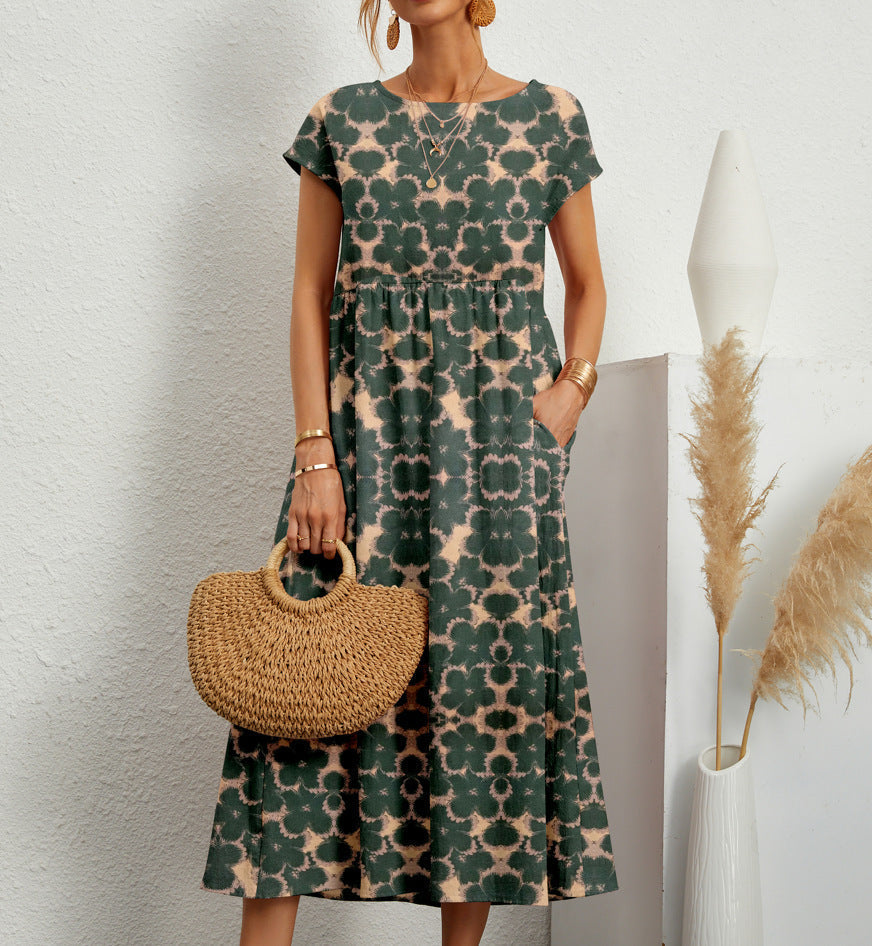 Zomerse bloemenprint damesjurk, midi lengte, wijde A-lijn rok en zakken voor een luchtige en elegante look.