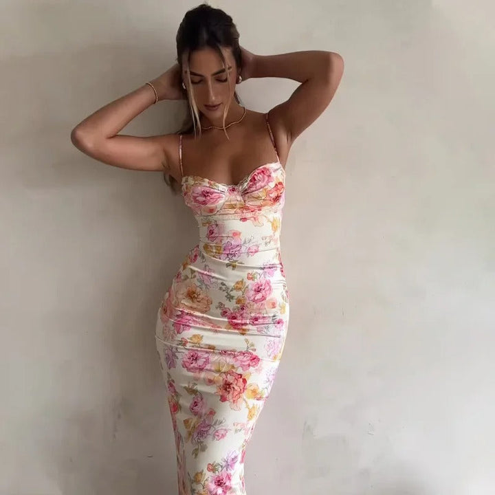 Dames bloemen bodycon midijurk met spaghettibandjes, ideaal voor elegante zomerlooks en feesten.