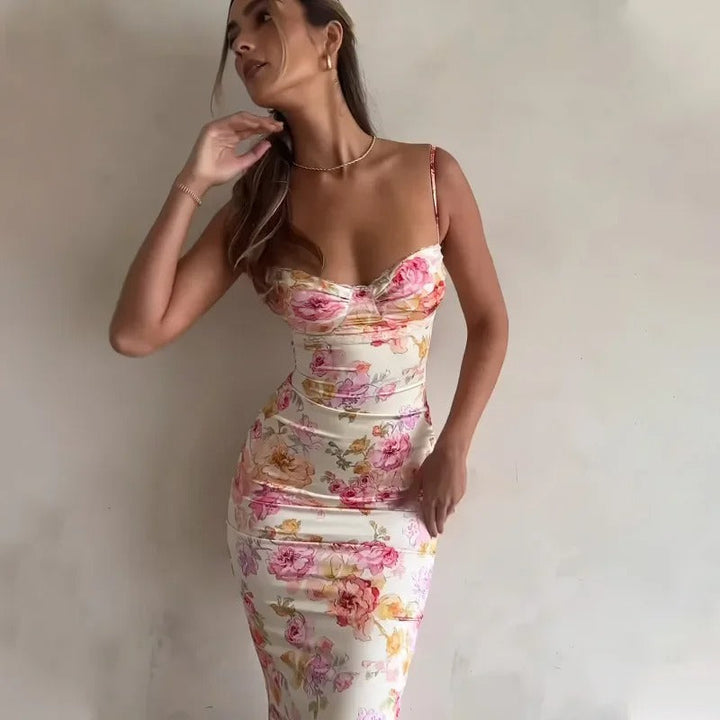 Casual & feestelijke bloemenprint midijurk met spaghettibandjes; een flatterende bodycon jurk voor elke gelegenheid.