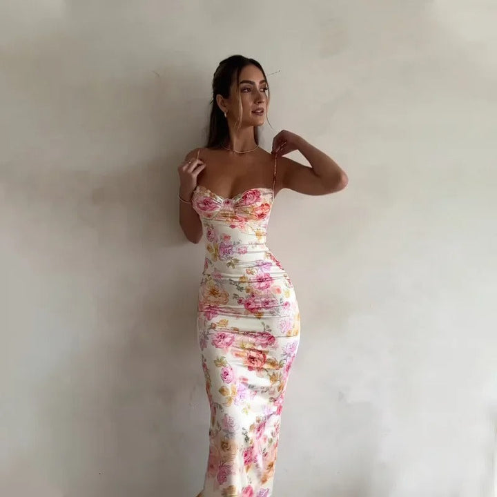 Lente/zomer dames bodycon midijurk met prachtige bloemenprint en spaghettibandjes voor een stijlvolle, elegante look.
