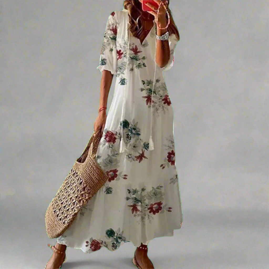 Dames bloemen maxi jurk A-lijn, perfect voor een zomerse dag of strand. Elegante casual look.