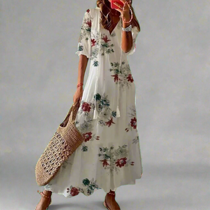 Dames bloemen maxi jurk A-lijn, perfect voor een zomerse dag of strand. Elegante casual look.