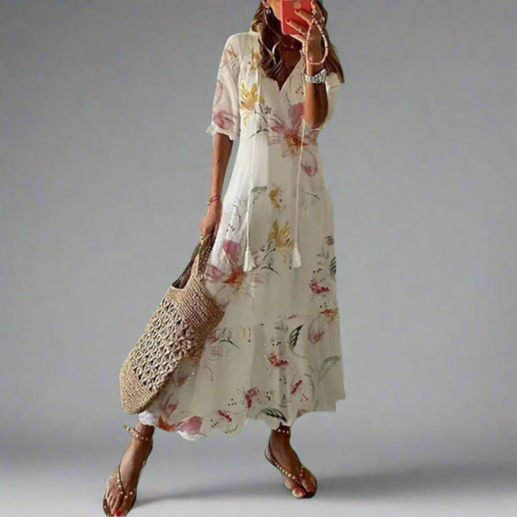 Elegante bloemen maxi jurk voor dames, A-lijn model met V-hals en korte mouwen. Ideaal voor feestjes.
