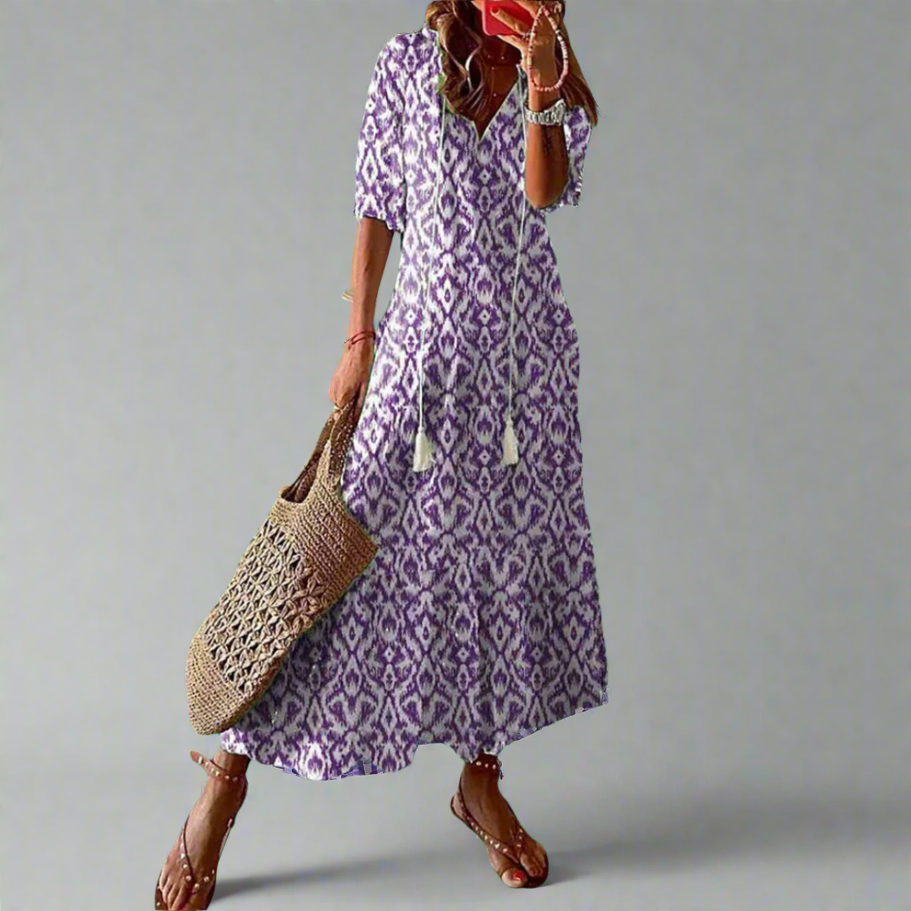 Bloemenprint maxi jurk voor dames, A-lijn silhouet. Deze elegante jurk met korte mouwen is ideaal voor de zomer.