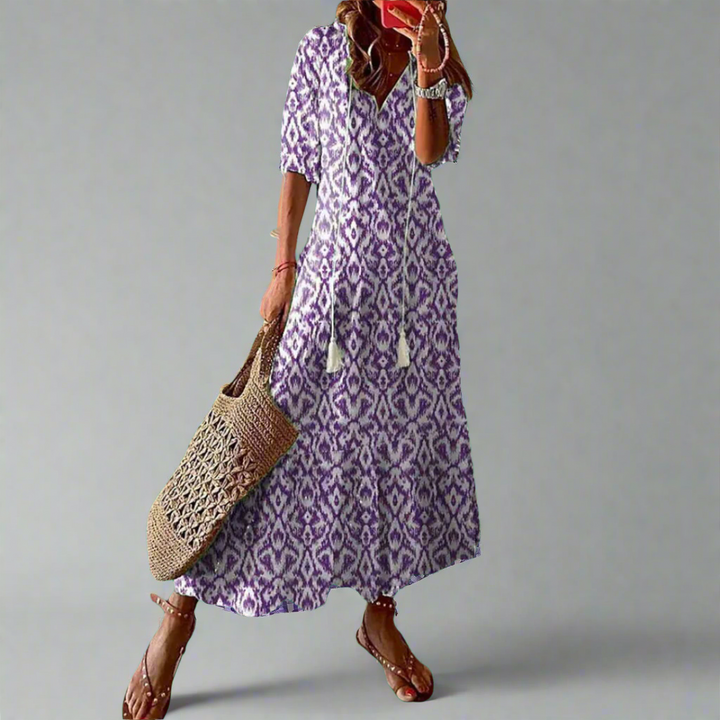Bloemenprint maxi jurk voor dames, A-lijn silhouet. Deze elegante jurk met korte mouwen is ideaal voor de zomer.