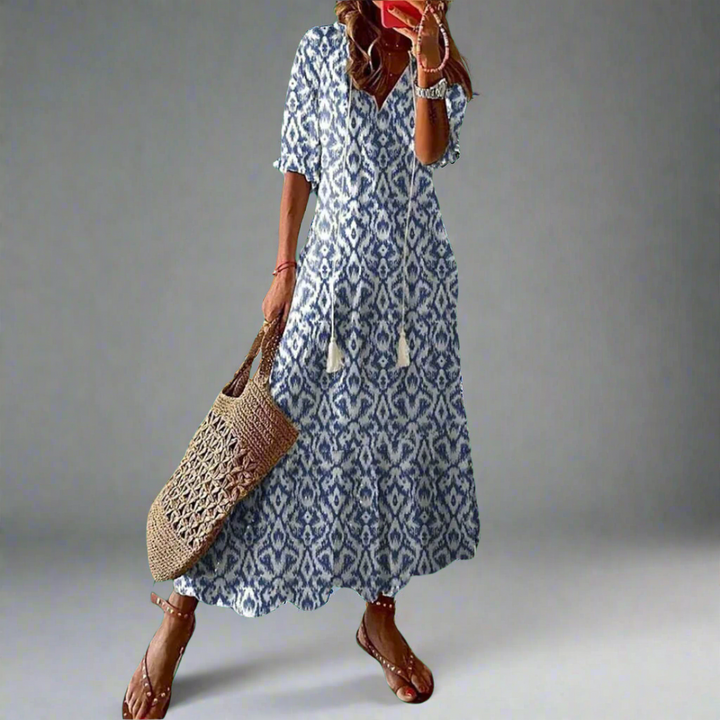 Luchtige dames zomerjurk, maxi lengte met bloemenprint en A-lijn pasvorm. Perfect voor een elegante casual stijl.