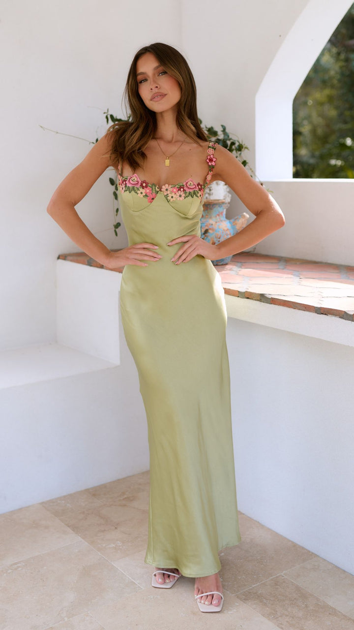 Elegante bloemen midijurk slipdress met spaghettibandjes, perfect voor feestjes of een stijlvolle zomerlook.