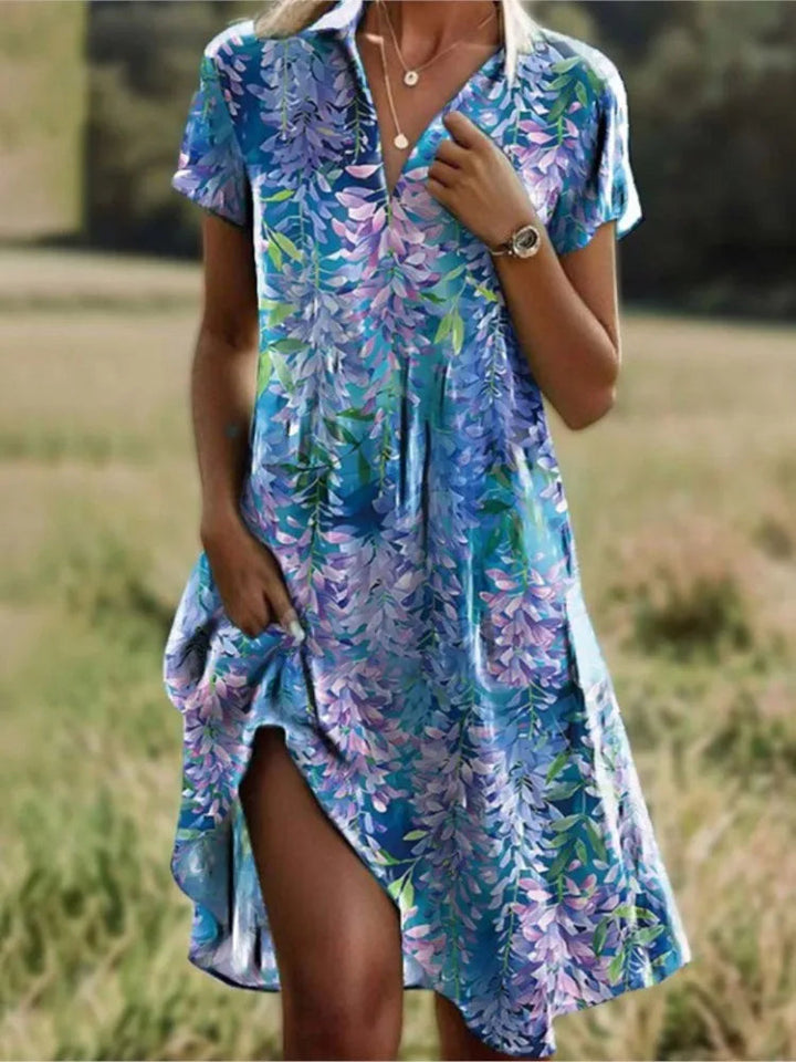 Dames zomerjurk met korte mouwen en comfortabele losse pasvorm, ideaal voor warme dagen.