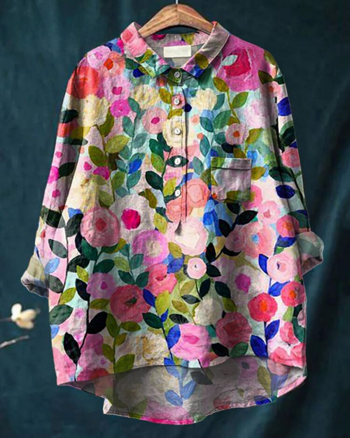 Dames bloemenprint blouse met elegante knoopsluiting en lange mouwen. Perfect voor lente/zomer mode.