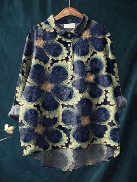 Levendige bloemenprint dames blouse met lange mouwen en knoopsluiting. Trendy en comfortabel.