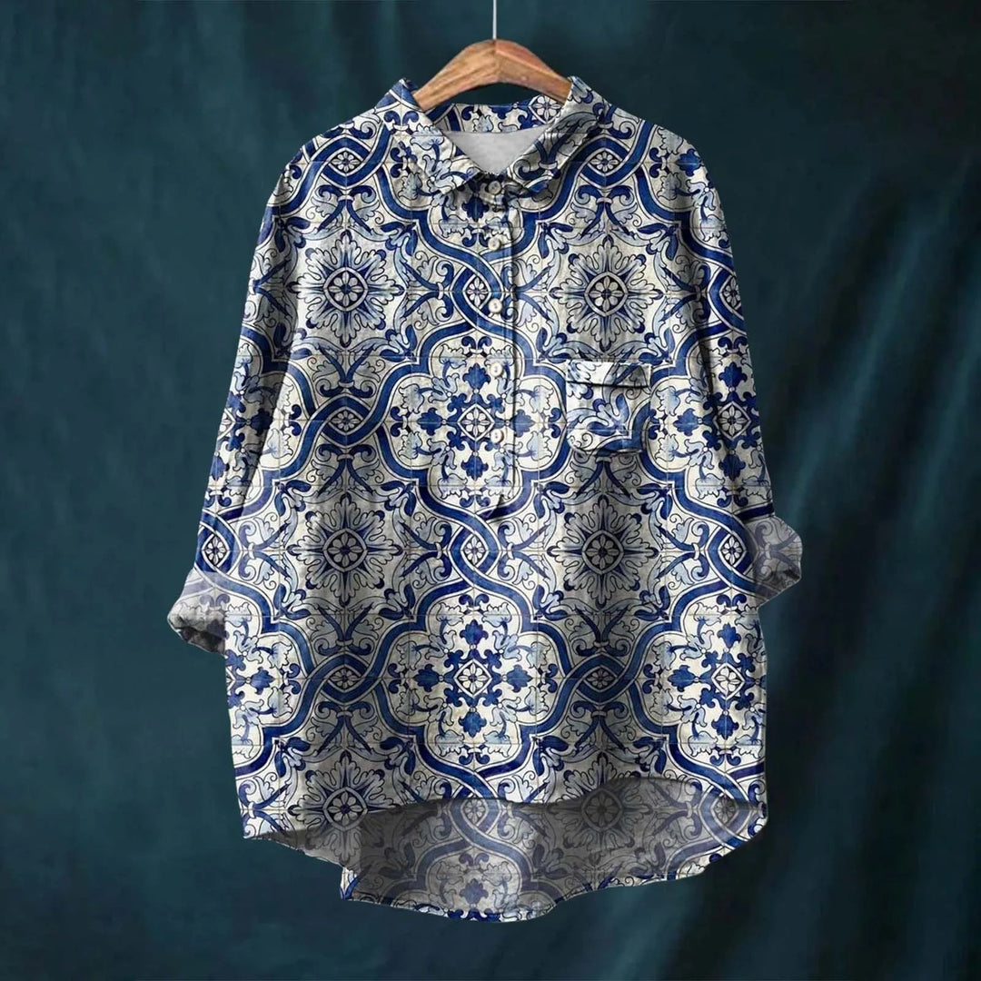 Comfortabel dames shirt met lange mouw en levendige bloemenprint, perfect voor mode en vrije tijd.