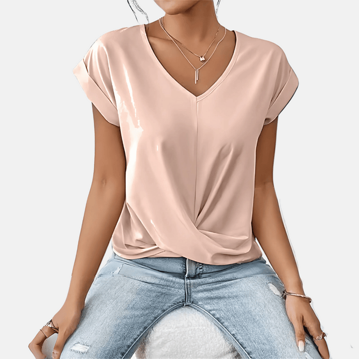Elegante dames top, effen design met comfortabele V-hals, ideaal voor zomerse casual outfits.