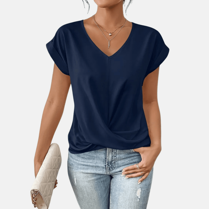 Stijlvolle V-hals blouse voor dames, met gedrapeerde zoom, perfect voor een modieuze en comfortabele look.