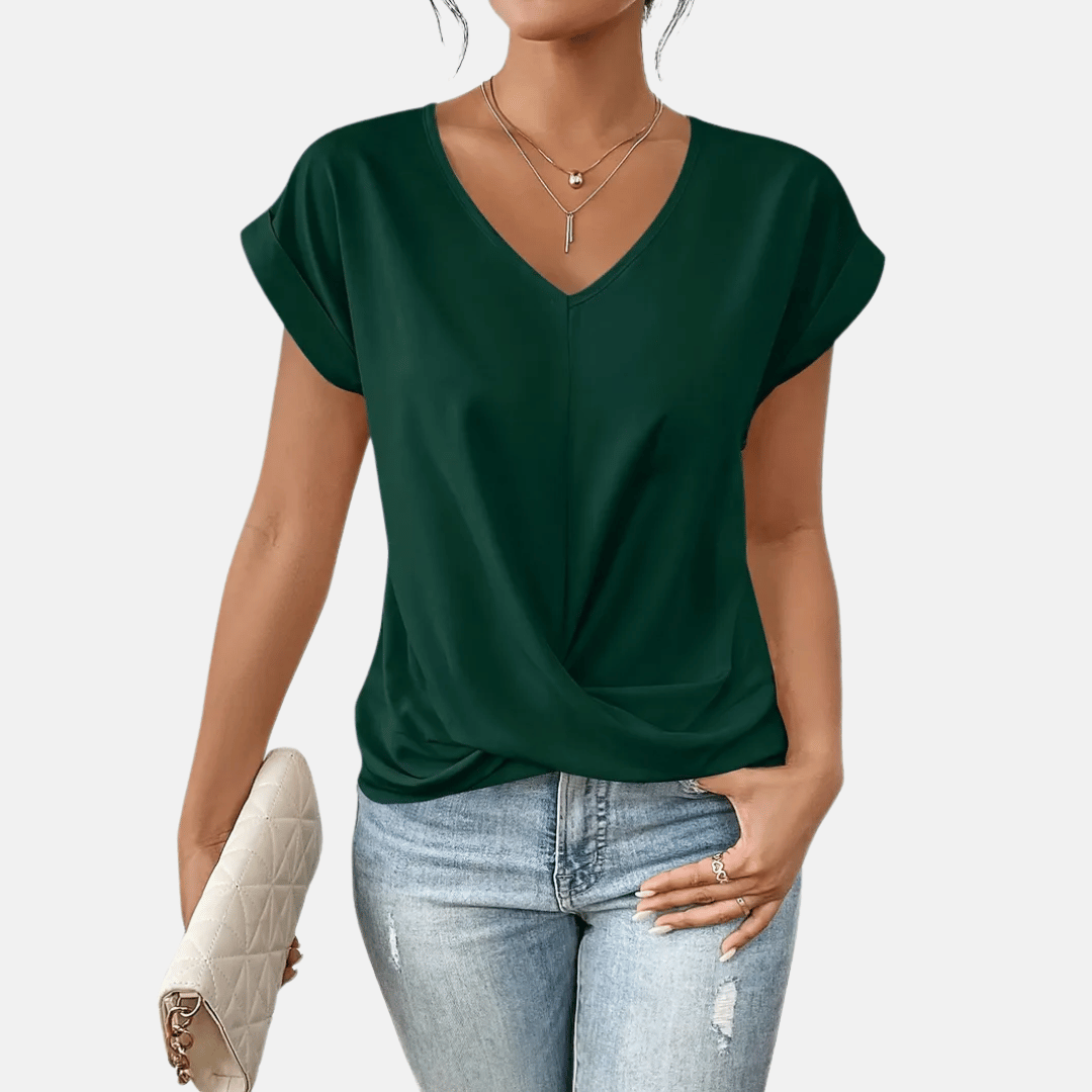 Lente/zomer dames blouse: effen V-hals top met elegante gedrapeerde zoom, voor een frisse uitstraling.