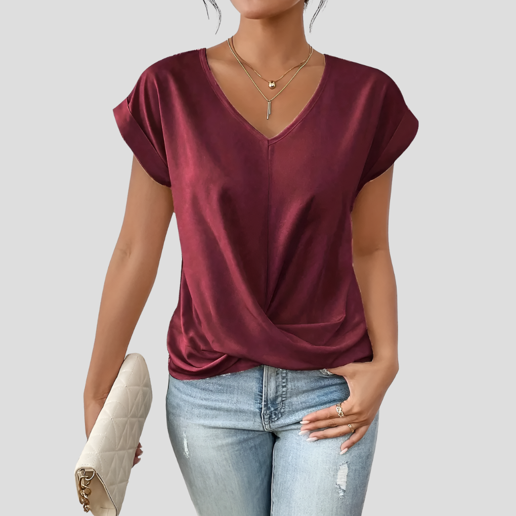 Dames blouse met V-hals en gedrapeerde onderkant, een comfortabele en elegante keuze voor modieuze vrouwen.