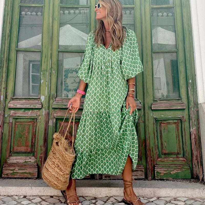 Dames boheemse V-hals jurk met pofmouwen. Ideaal als comfortabele zomer- of strandjurk. Casual elegantie.