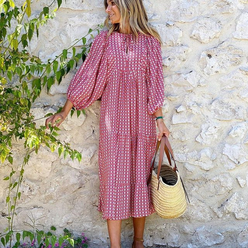 Modieuze Cazual™ zomerjurk voor dames, met V-hals en trendy pofmouwen. Perfect voor een bohemian look.
