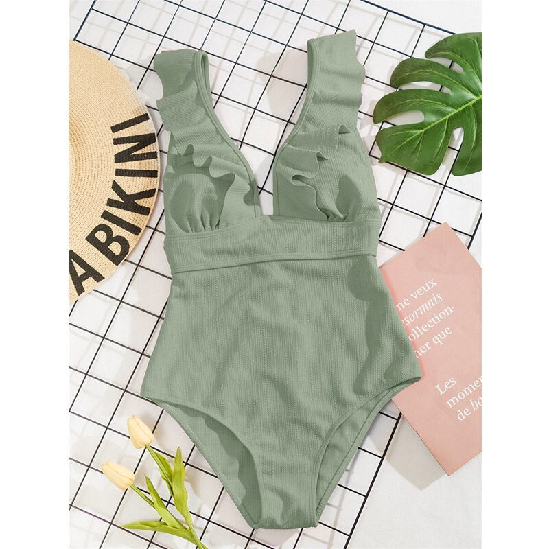 Meerkleurig dames zwempak, boho look, met V-hals en ruches voor een zomerse touch.