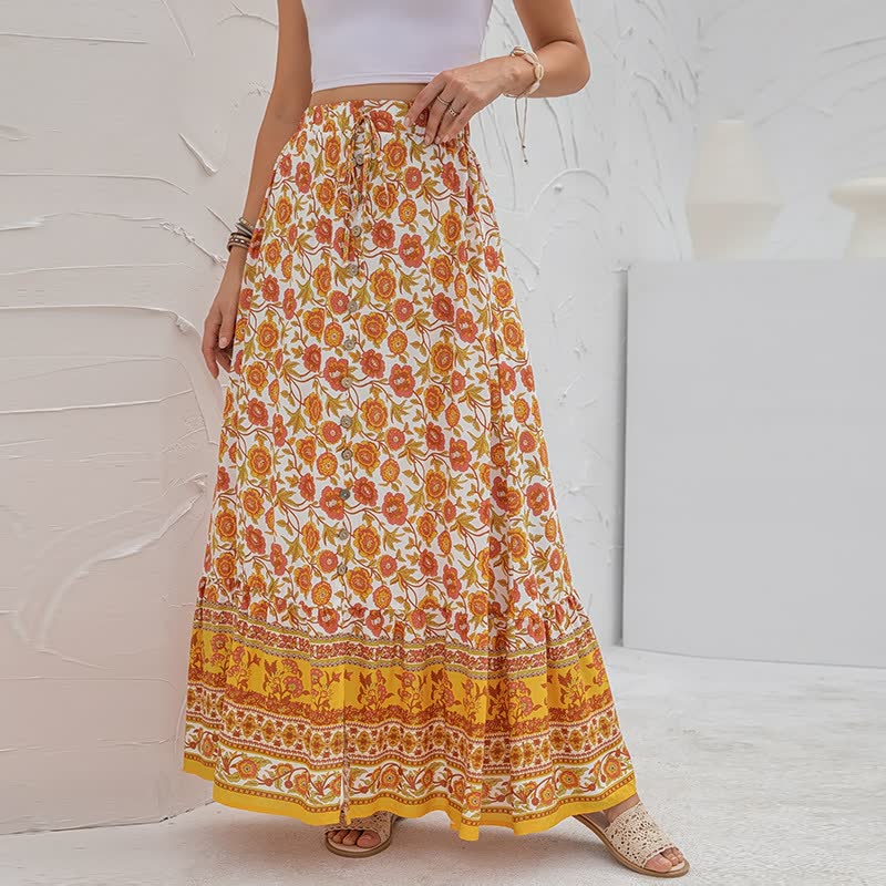 Trendy lange boho damesrok met hoge split, ideaal voor een luchtige zomerlook.