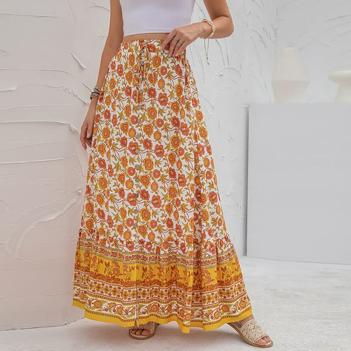 Trendy lange boho damesrok met hoge split, ideaal voor een luchtige zomerlook.