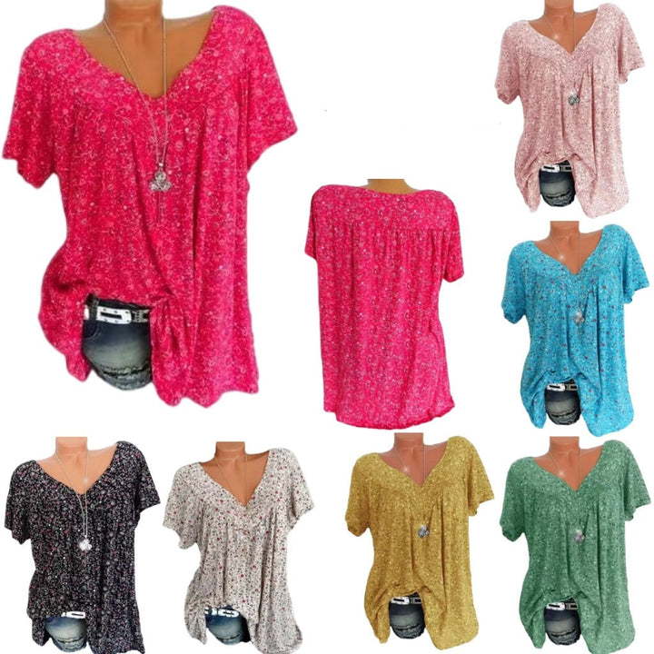 Dames boho zomerblouse Celeste met vrolijke bloemenprint en korte mouwen, ideaal voor een casual zomerlook.