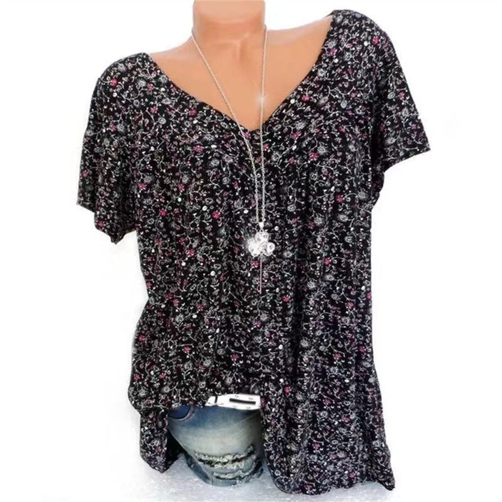Losvallende dames boho zomerblouse met bloemenprint en v-hals, perfect voor comfortabele strandkleding.