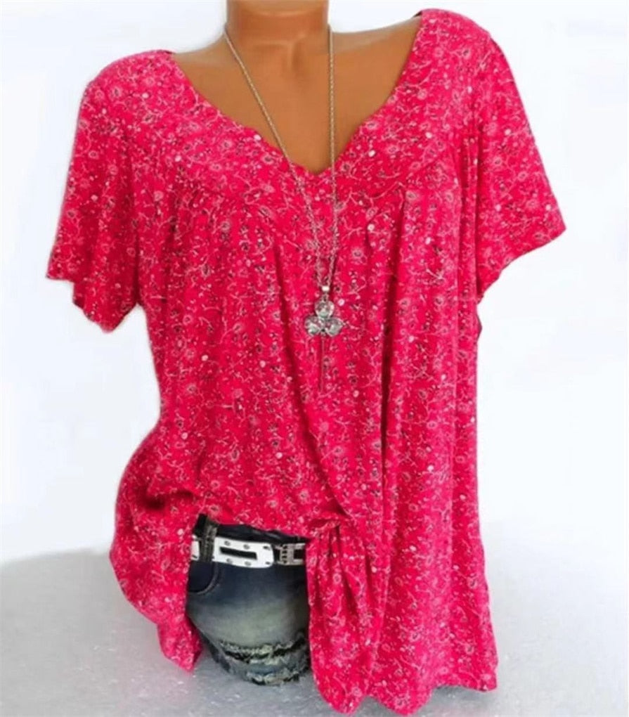 Vrouwenkleding: modieuze zomerblouse met bloemenprint, korte mouwen en boho v-hals, perfect voor casual dagen.