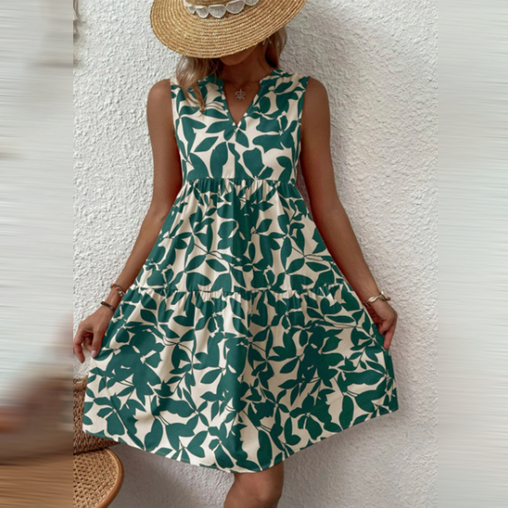 Casual dames midi-jurk met bloemenprint en V-hals, perfecte strandkleding voor de zomer.