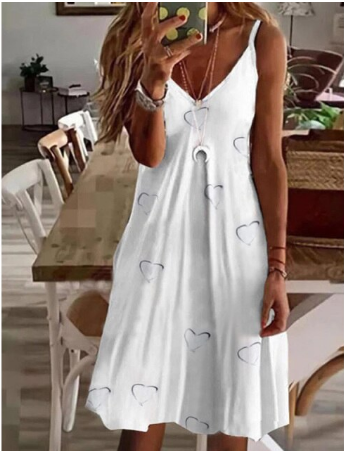 Comfortabele boho dames zomerjurk met trendy vrolijke print; stijlvolle mini jurk voor casual zomerdagen.